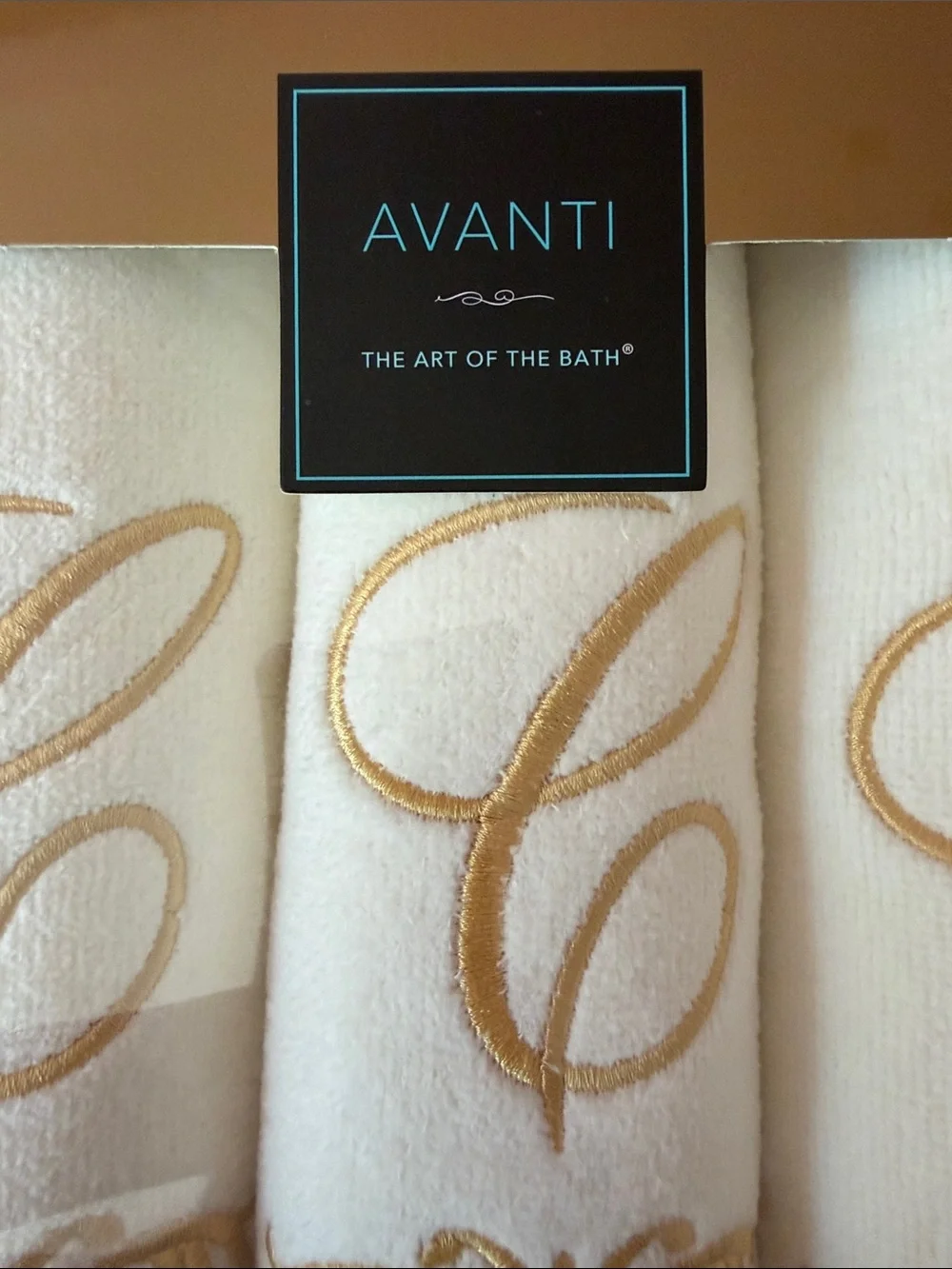 Avanti White Fingertip Towels with Gold Monogram Embroidery